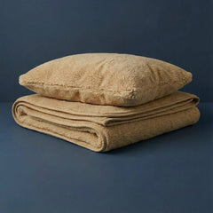 Összehajtott gyapjú paplan, párna garnitúra